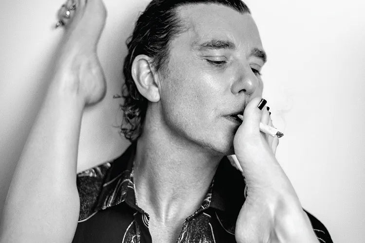 A close crop of Gavin Rossdale's black-and-white smoking portrait.