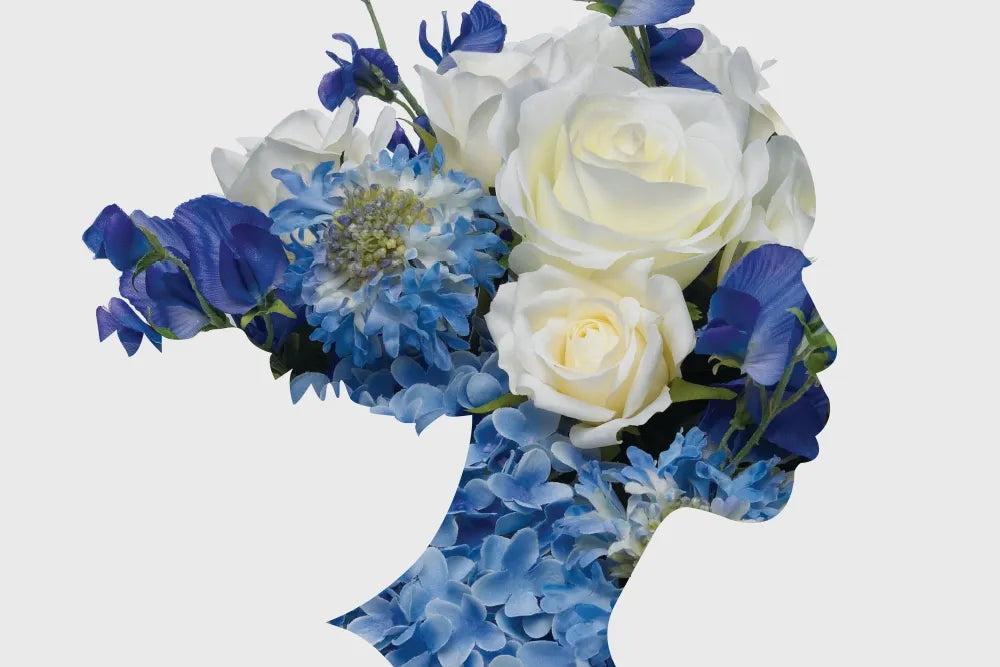 Story artwork: A human profile composed of blue and white flowers.