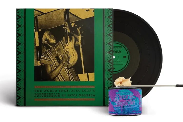 A close crop of The World Ends album, vinyl and cannabis concentrate pairing.