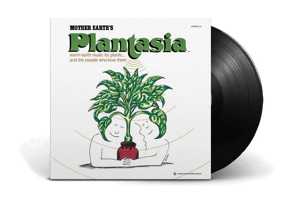 Mort Garson's Plantasia album beside a black vinyl record.