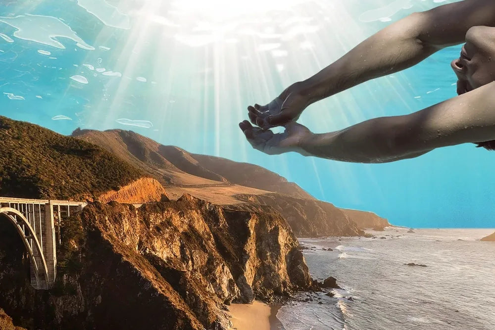 A swimmer superimposed above Big Sur's bridge and rugged coastal cliffs.