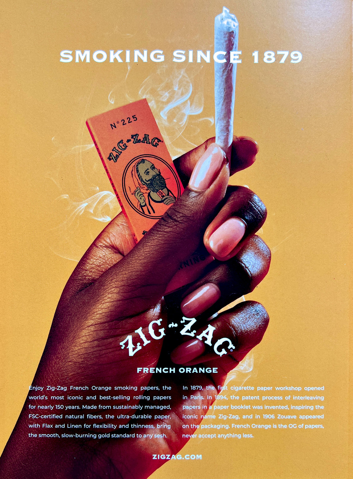 The Genesis Issue's Zig-Zag back-cover advertisement, with a hand holding a lit joint.